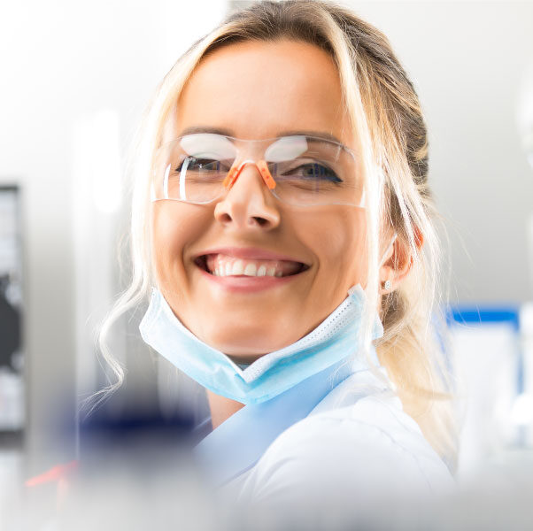 smiling woman working in a laboratory