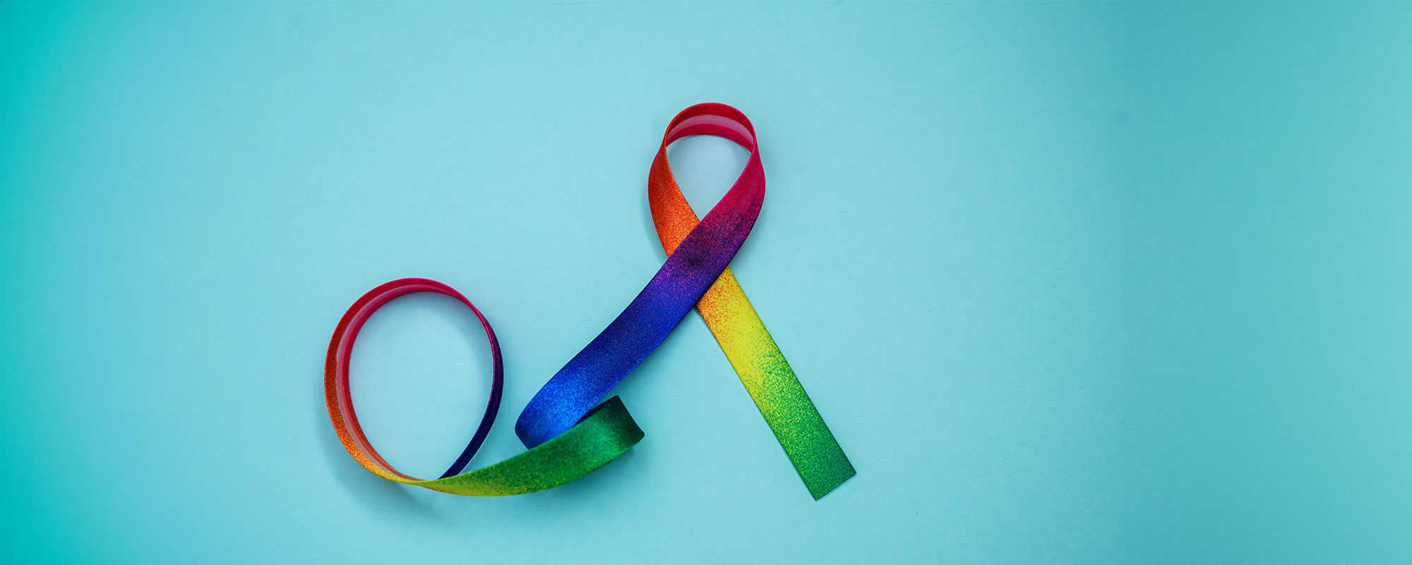 a rainbow colored LGBT awareness ribbon