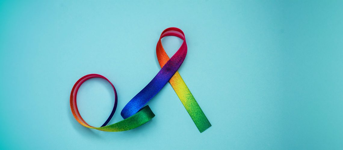 a rainbow colored LGBT awareness ribbon